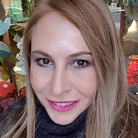 Evi Taxiarchou, Private Employee