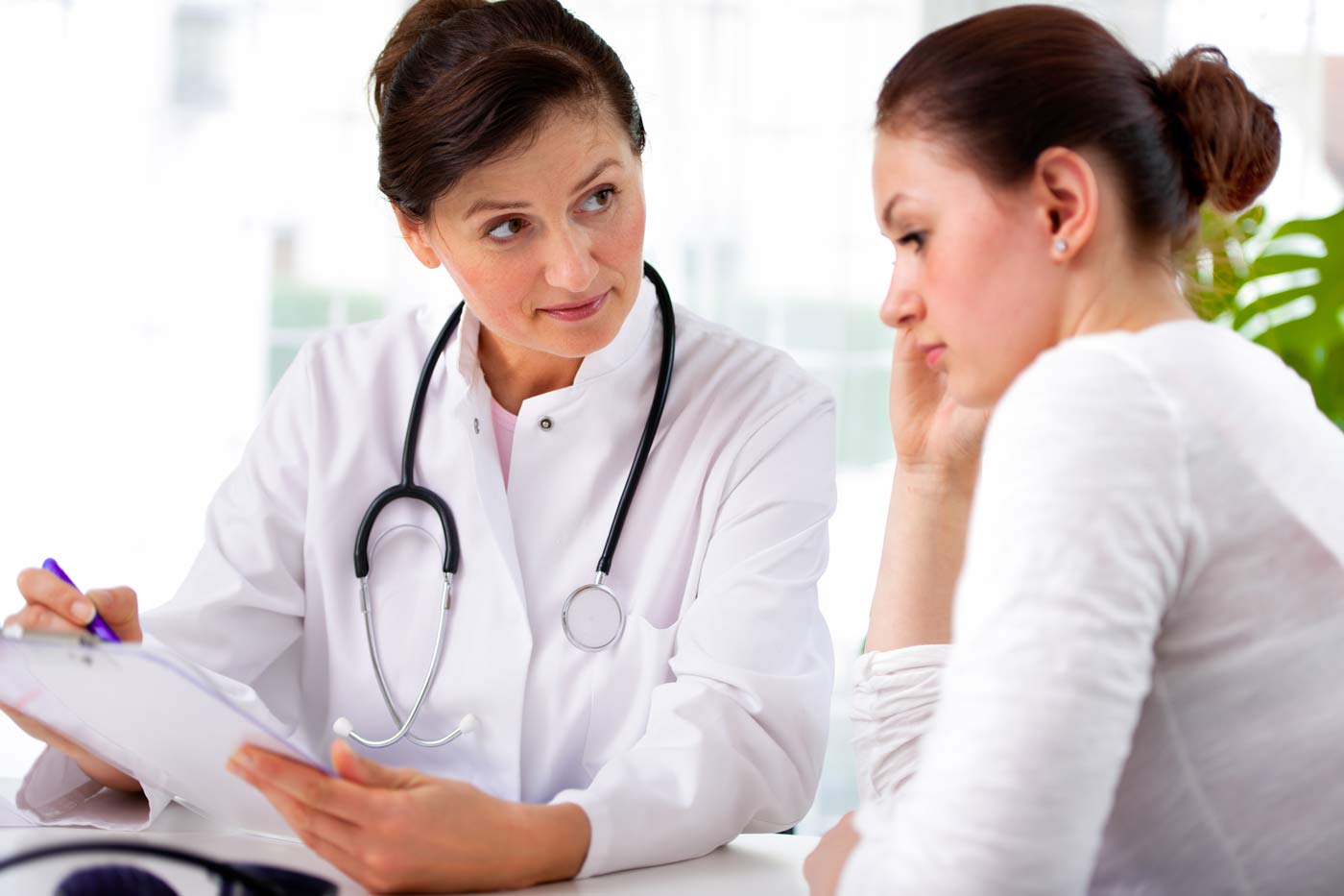 doctor consults patient for cancer treatment