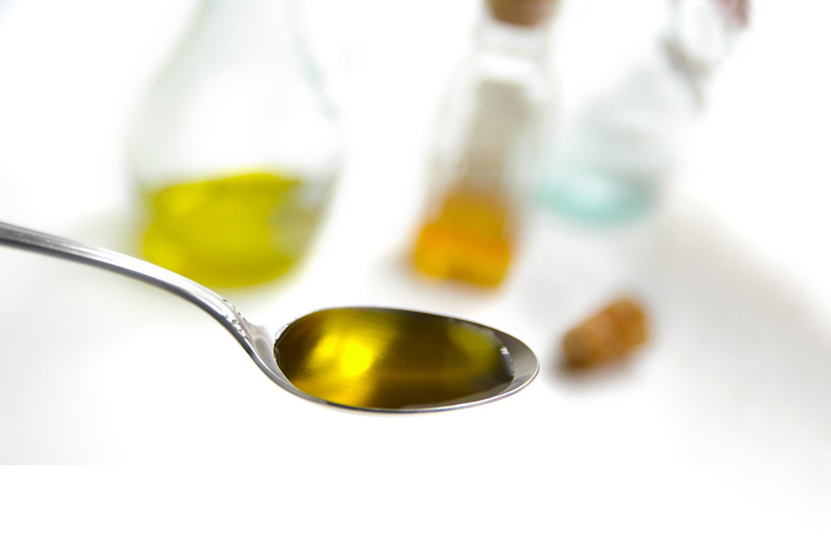 olive oil in spoon